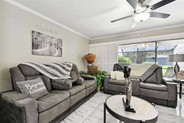 living room with ceiling fan and ornamental molding