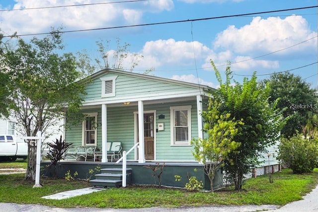 bungalow-style house featuring covered porch