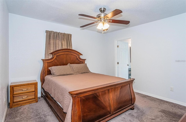 bedroom featuring ceiling fan and light colored carpet