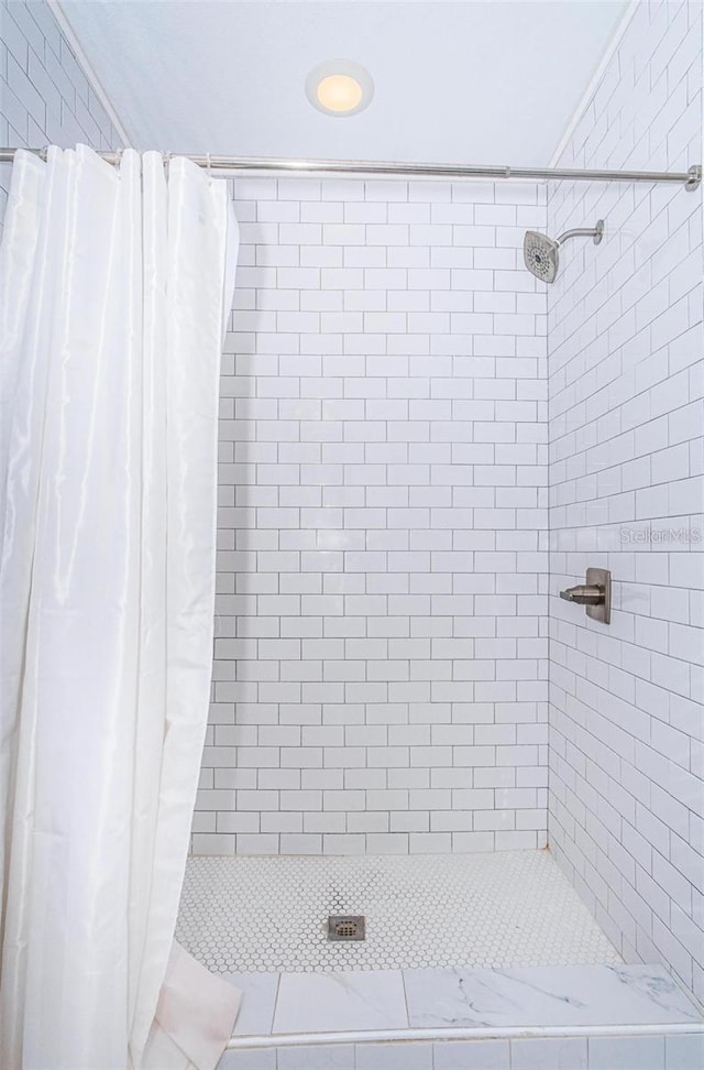 bathroom with curtained shower