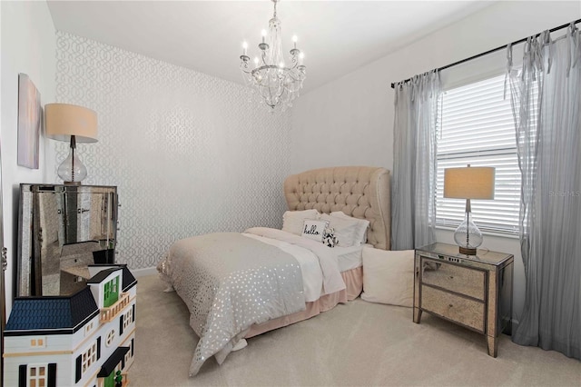 bedroom with light carpet and a notable chandelier