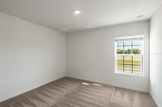 view of carpeted spare room