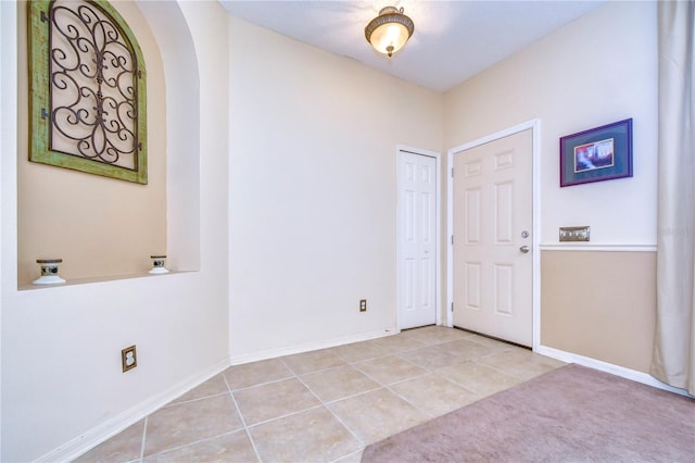 view of tiled foyer entrance