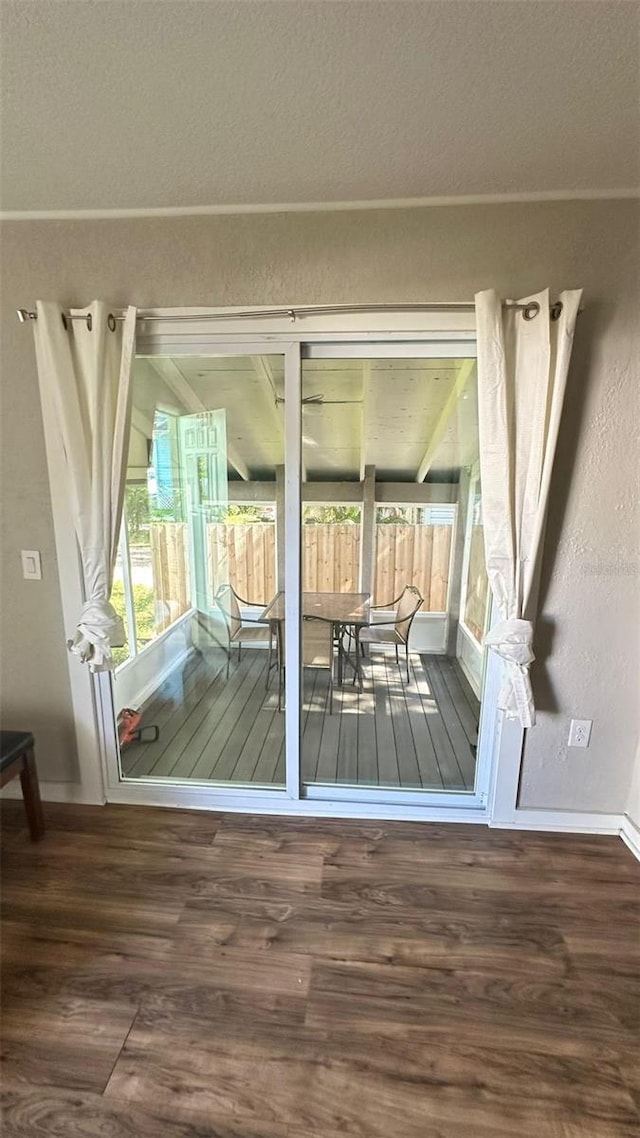 entryway with dark hardwood / wood-style floors