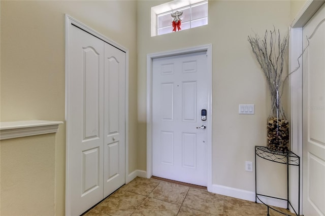 view of tiled foyer entrance