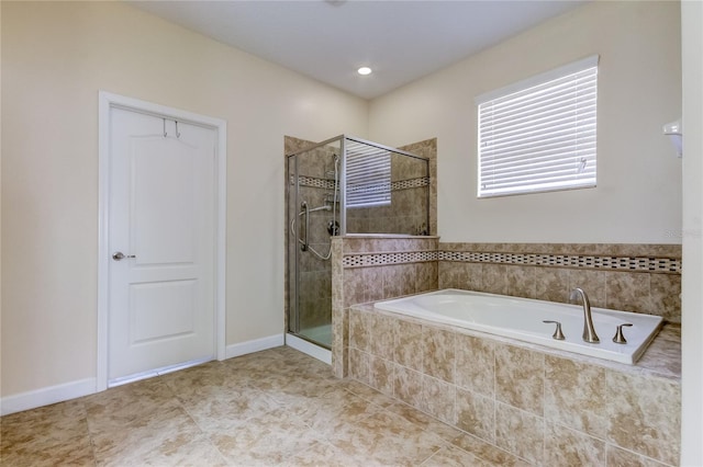 bathroom with plus walk in shower and tile patterned floors