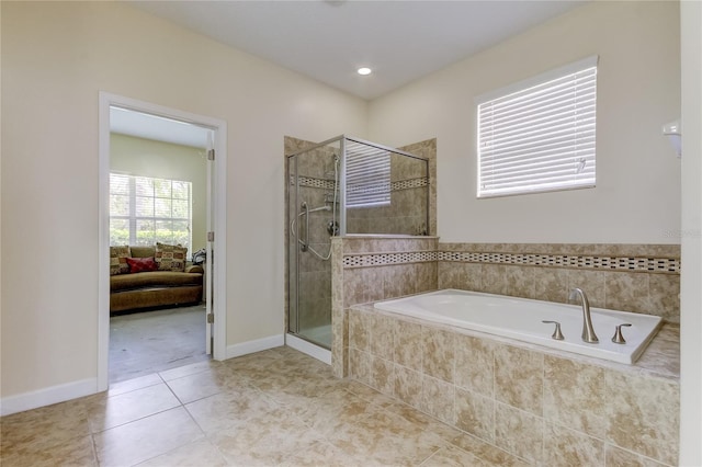 bathroom with tile patterned flooring and plus walk in shower