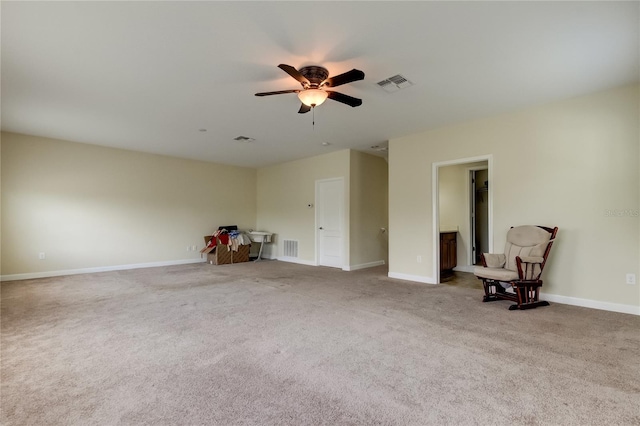 interior space with carpet and ceiling fan