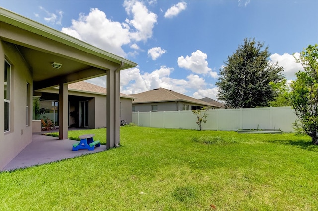 view of yard with a patio area