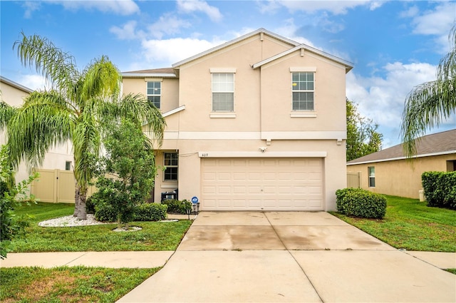 view of front property with a garage and a front yard