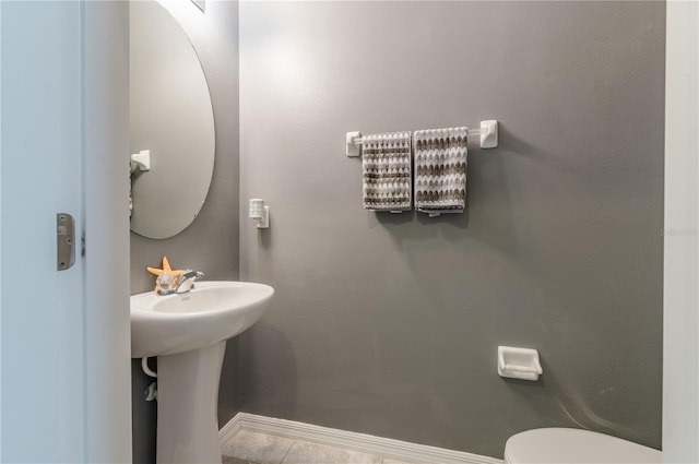 bathroom featuring tile patterned floors and sink