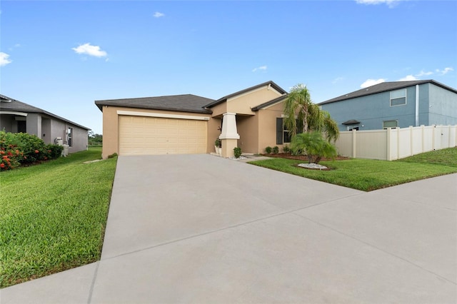 view of front of house featuring a front yard and a garage