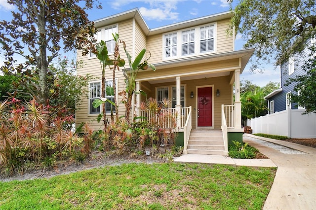 view of property featuring a porch