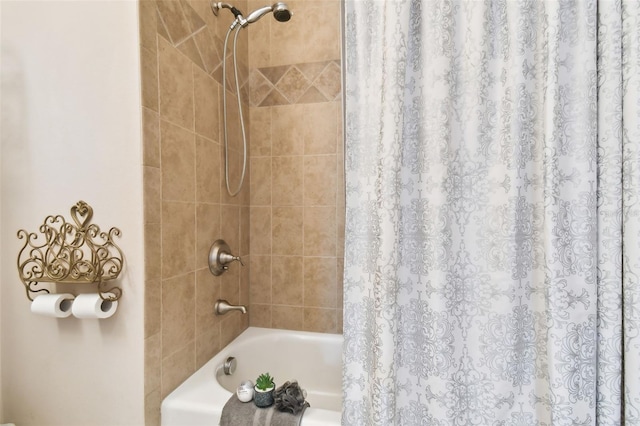 bathroom with shower / tub combo