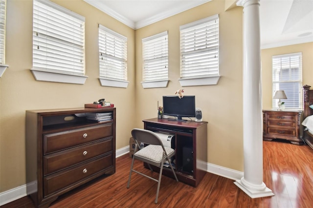 office area featuring ornamental molding, baseboards, dark wood-type flooring, and ornate columns