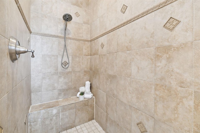 bathroom featuring tiled shower