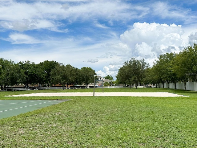 view of property's community featuring a yard