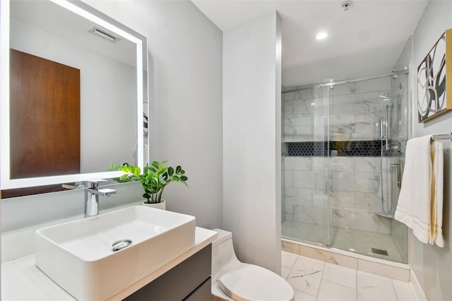 bathroom with tile patterned flooring, toilet, an enclosed shower, and vanity