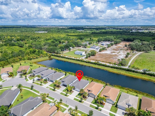 bird's eye view with a water view