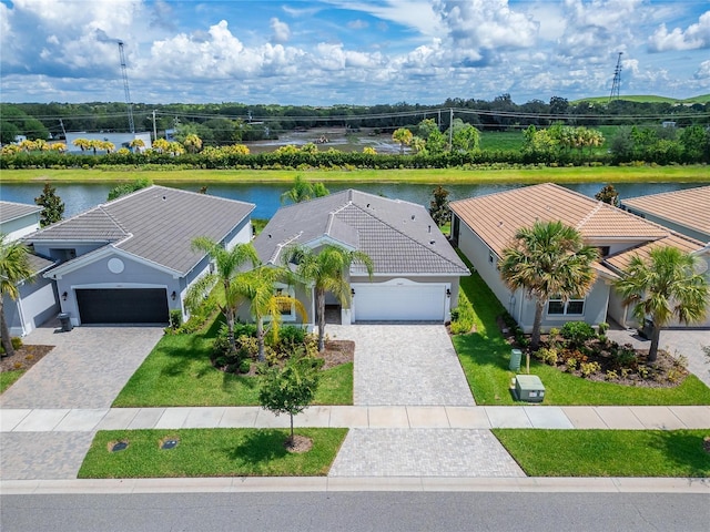 drone / aerial view featuring a water view