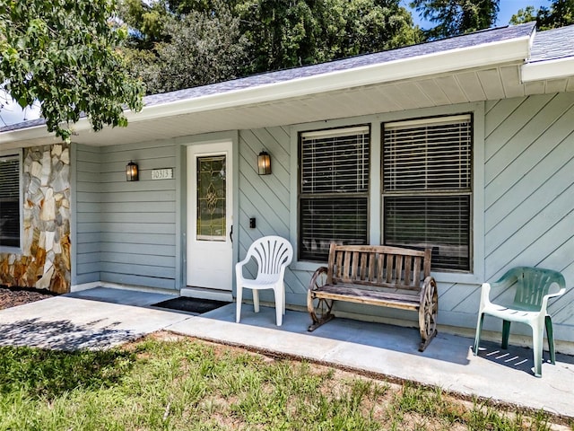 property entrance with a porch