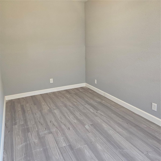 empty room with light wood-type flooring