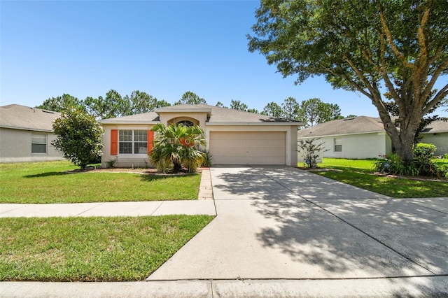 ranch-style home with a garage and a front yard