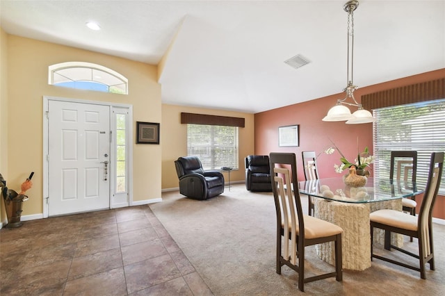 view of carpeted dining area