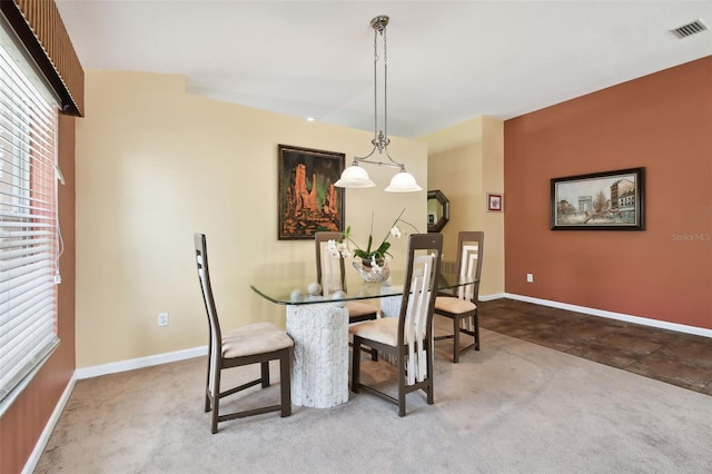 view of carpeted dining room