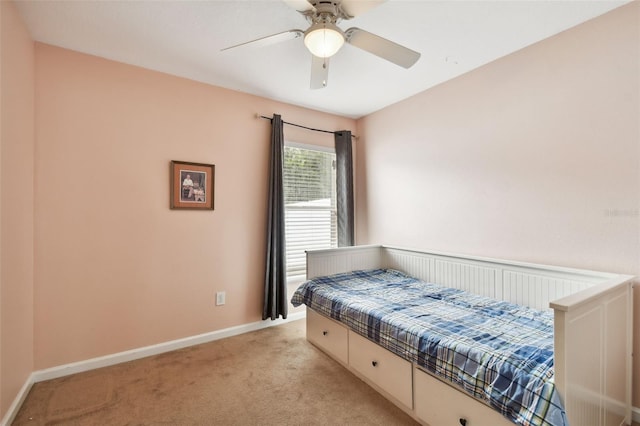 carpeted bedroom featuring ceiling fan