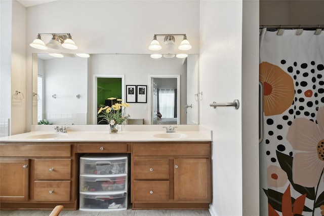 bathroom featuring vanity and a shower with curtain