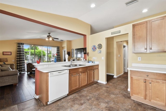 kitchen featuring lofted ceiling, dishwasher, ceiling fan, dark hardwood / wood-style floors, and sink