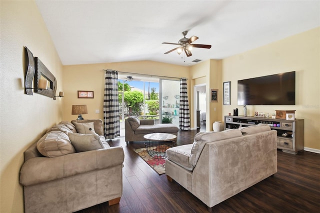 living room featuring vaulted ceiling, dark hardwood / wood-style floors, and ceiling fan