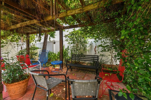 view of patio featuring a pergola