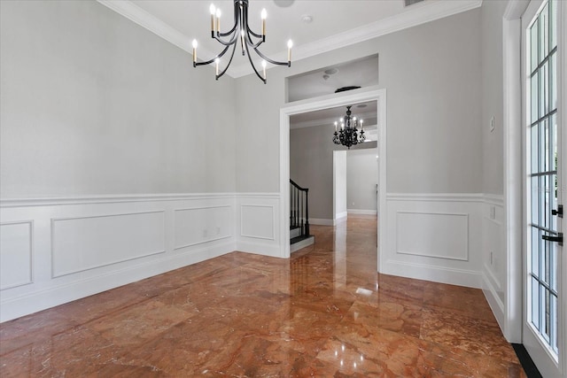 tiled spare room featuring an inviting chandelier and crown molding