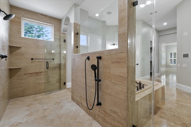 bathroom featuring tile flooring and plus walk in shower