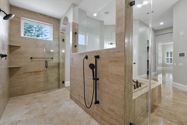 638 Limona Woods Dr, Brandon, FL 33510 - bathroom with a shower stall and baseboards
