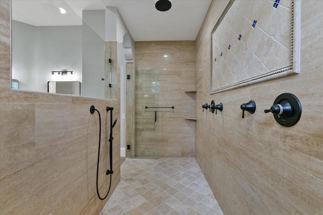 bathroom with a tile shower