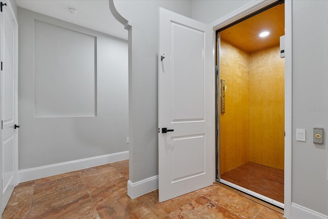 638 Limona Woods Dr, Brandon, FL 33510 - hall featuring baseboards, recessed lighting, and elevator