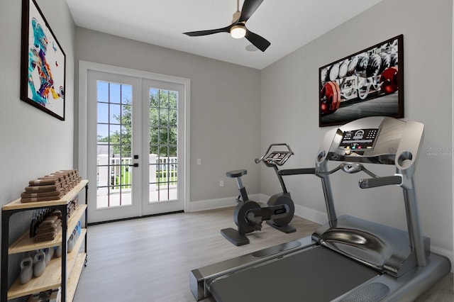 exercise room with wood-type flooring, ceiling fan, and french doors