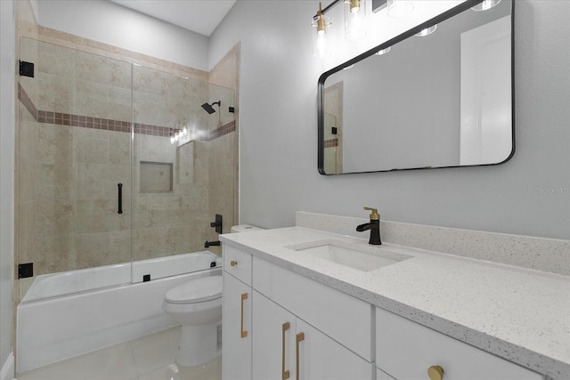 638 Limona Woods Dr, Brandon, FL 33510 - full bathroom featuring toilet, vanity, enclosed tub / shower combo, and tile patterned flooring