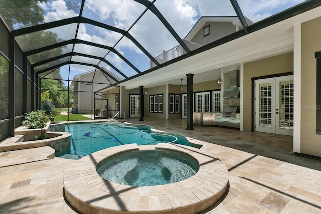 view of swimming pool featuring a patio area, french doors, grilling area, an in ground hot tub, and glass enclosure