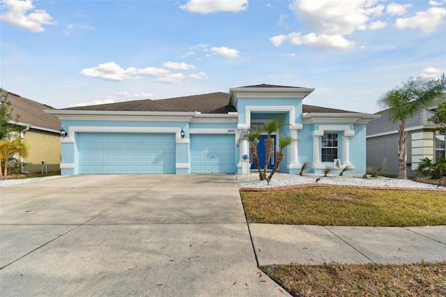 view of front of property featuring a garage