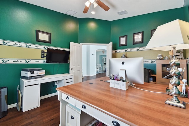 office area with dark hardwood / wood-style flooring, vaulted ceiling, and ceiling fan