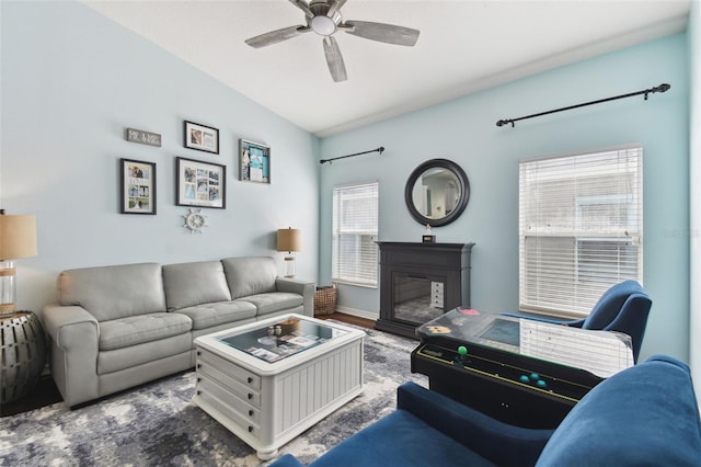 living room with hardwood / wood-style flooring and ceiling fan