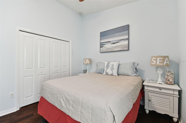 bedroom featuring a closet and dark hardwood / wood-style floors