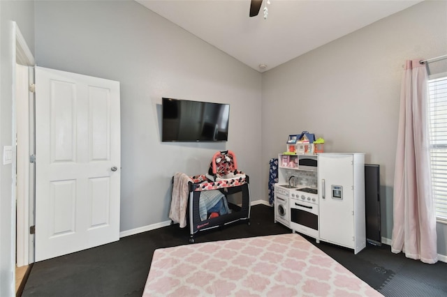 playroom with vaulted ceiling and ceiling fan