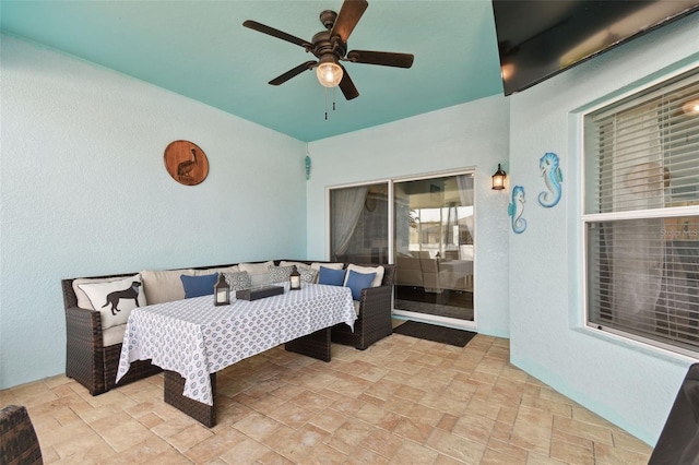 view of patio featuring ceiling fan and outdoor lounge area