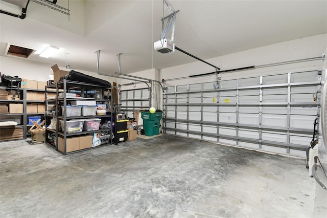 garage featuring a garage door opener