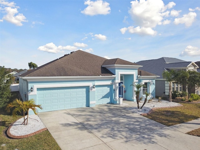 view of front of property with a garage